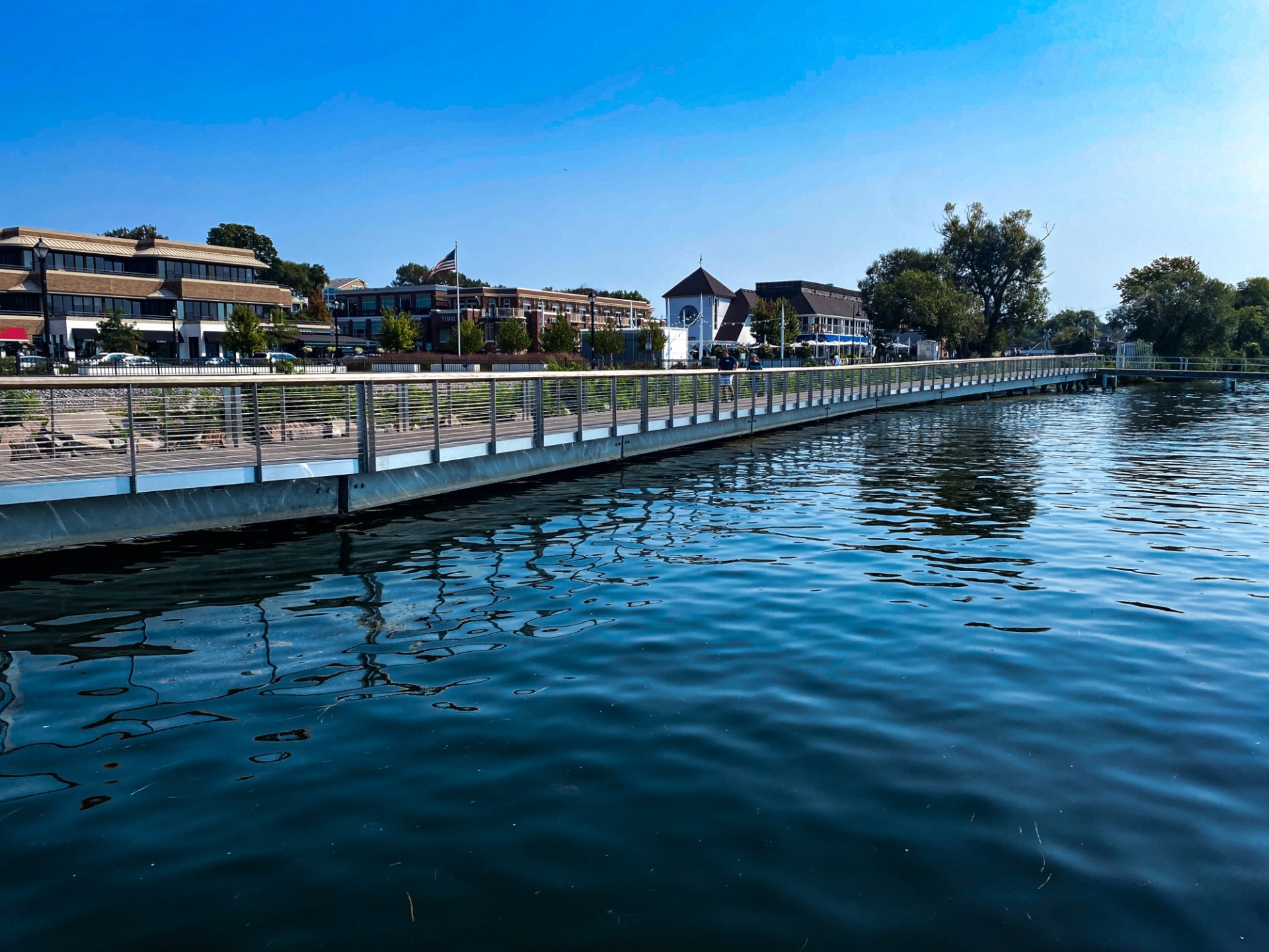 Lake Minnetonka shoreline view from downtown Wayzata on a calm summer afternoon